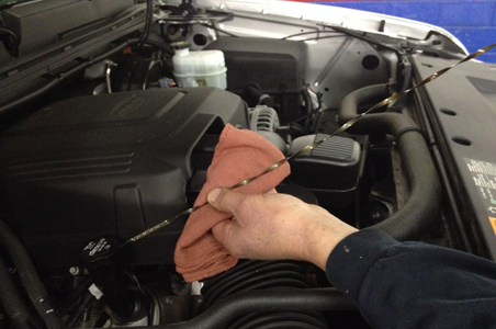 Here is one of our certified mechanics completing an oil change and filter change to properly maintain this car’s engine.